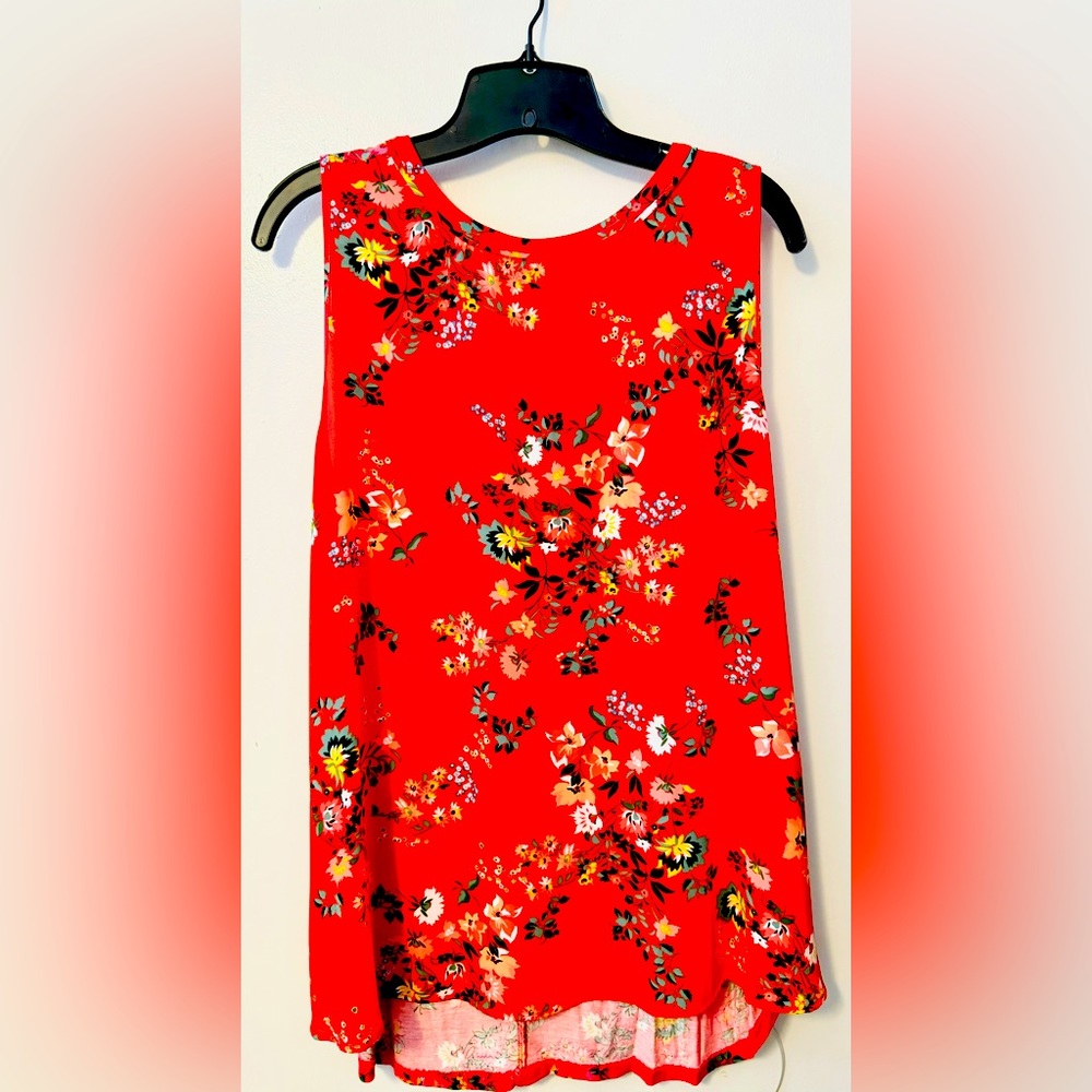 Loft - Gently used size XL multicolored top. Top ties in the back.
